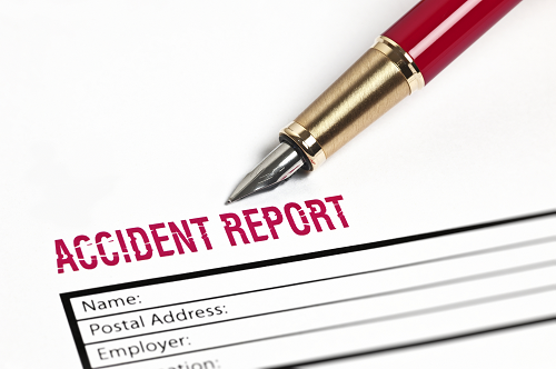 a close up of an accident report claim document